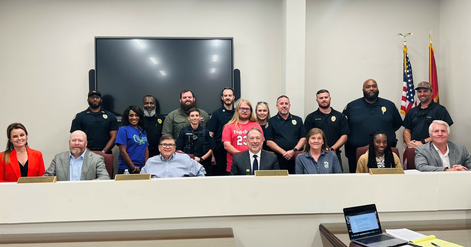 Members of the Gluckstadt Police Department pose with the Mayor and Board of Aldermen.